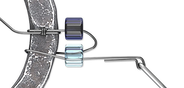 Seed beads being looped onto a ring